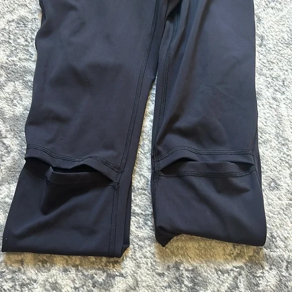 Lululemon size 6 black leggings with knee slits/cut outs - Picture 2 of 3